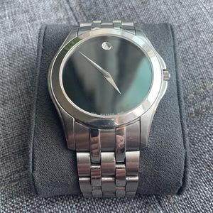 MEN’S SILVER MOVADO LINK WATCH.